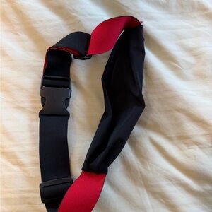 Peloton Black Belt Bag Sling Pack Reflective Zip Adjustable Strap